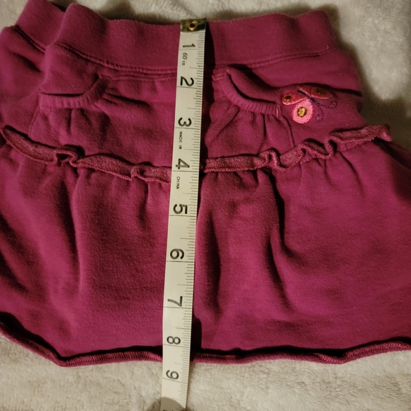 Guess Baby Plum baby skirt with bottom snaps. - Picture 10 of 10